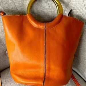 Jcrew saddle brown purse/ bag. Bracelet handle in brass. NWT